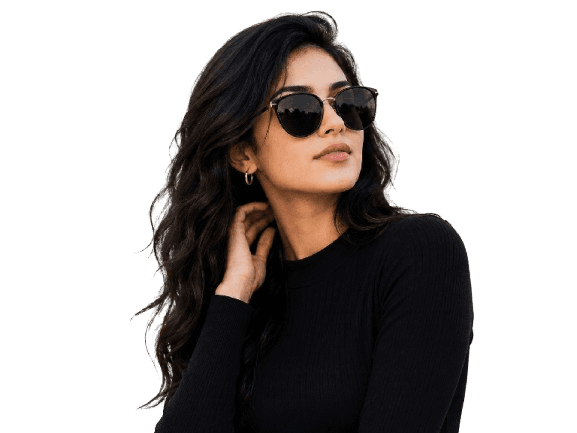 Model wearing dark round sunglasses